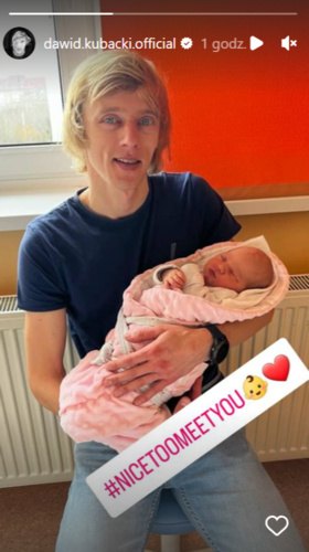 Pictured: Dawid Kubacki with a photo of his newborn daughter on Instagram / dawid.kubacki.official