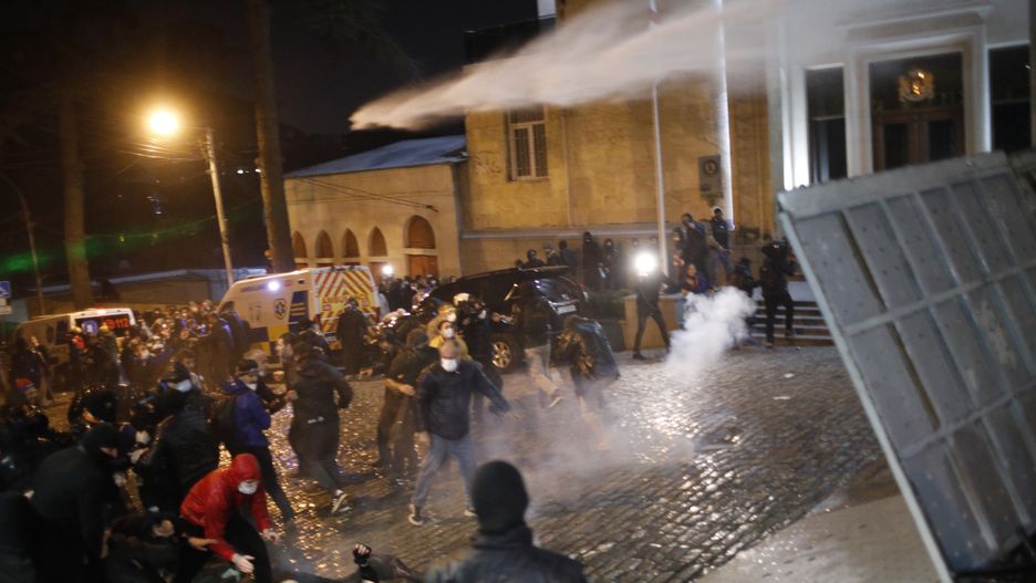TBILISI, GEORGIA - MARCH 08: Clashes erupt between Georgian police and protesters on the second day of protest against "foreign agents" bill, in Tblisi, Geogia on March 08, 2023 (Photo by David Mdzinarishvili/Anadolu Agency via Getty Images)