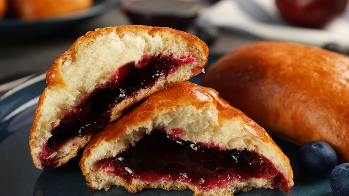 Delicious baked patties with jam and blueberries on plate, closeupDelicious baked patties with jam and blueberries on plate, closeupLiudmila Chernetskabackground, blueberries, bun, closeup, cook, delicious, eat, fresh, healthy, jam, natural, nobody, nutrient, object, pastry, patties, patty, pie, pirogi, pirozhok, russian, slavic, tasty, traditional, ukrainian