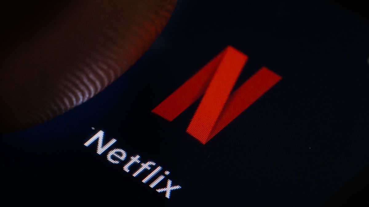 BERLIN, GERMANY - MARCH 10: In this photo illustration the logo of Netflix can be seen on a smartphone on March 10, 2022 in Berlin, Germany. (Photo Illustration by Thomas Trutschel/Photothek via Getty Images)