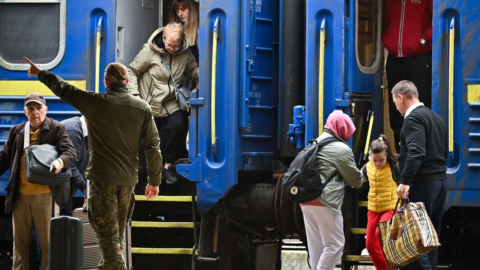 PRZEMYSL, POLAND - MARCH 30: People, mainly women and children, arrive at Przemysl train station after journeying from war-torn Ukraine on March 30, 2022 in Przemysl, Poland. The Polish government has said it may spend €24 billion this year hosting refugees fleeing the war in Ukraine, and is seeking more support from the European Union. With more than 4 million Ukrainian refugees, Poland is now the country with the second-largest foreign refugee population after Turkey. (Photo by Jeff J Mitchell/Getty Images)
