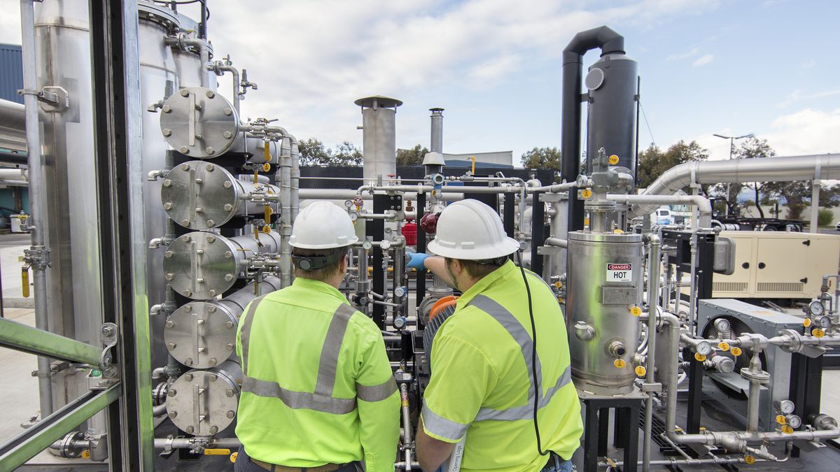 Worker inspecting a solid waste processing plant
Rear view of twoo men wearing safety equipment inspecting a dry anaerobic digestion (AD) solid waste processing facility which converts food and green organic waste into biogenic compressed natural gas (CNG).
Billy Hustace
biogenic, emissions reduction, biogas, renewable fuel production, zero waste
