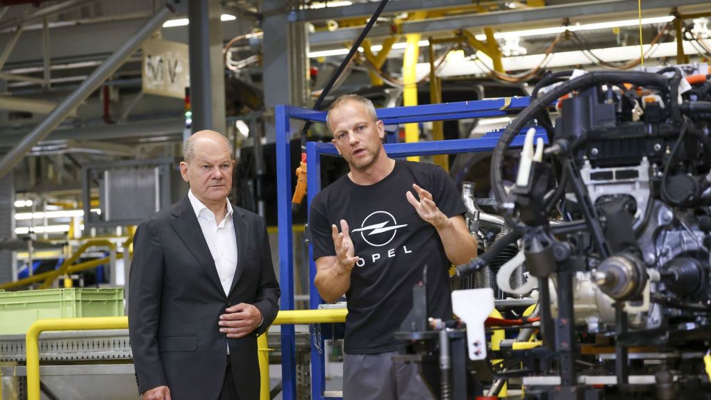 German Chancellor Olaf Scholz Delivers Speech At 125th-Anniversary Celebrations Of The Opel Russelsheim Plant
Olaf Scholz, Germany's chancellor, left, listens to an employee on the production line during 125th anniversary celebrations at the Opel Russelsheim Plant in Russelsheim, Germany, on Saturday, June 8, 2024. Stellantis NV and Mercedes-Benz Group AG are putting work on two electric-vehicle battery plants on hold and may pivot to manufacturing lower-cost cells in light of slowing demand for still-expensive EVs. Photographer: Alex Kraus/Bloomberg via Getty Images
Bloomberg
vehicles, emea, manufacture, autos, transportation and logistics, european, fabrication, vehicle, euro members, german, business news, city transport, e.u., eu, automotive, cars, automobiles, automobile, auto, industries