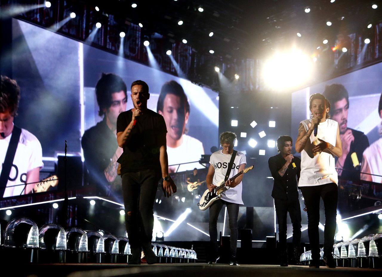 PASADENA, CA - SEPTEMBER 11, 2014 -- One Direction performs during their, "Where We Are," tour at the Rose Bowl on September 11, 2014.. L/R -- Liam Payne, Niall Horan, Zayn Malik, Louis Tomlinson. (Genaro Molina/Los Angeles Times via Getty Images)