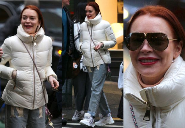 Zniszczona Lindsay Lohan uśmiecha się do fotografów w Nowym Jorku