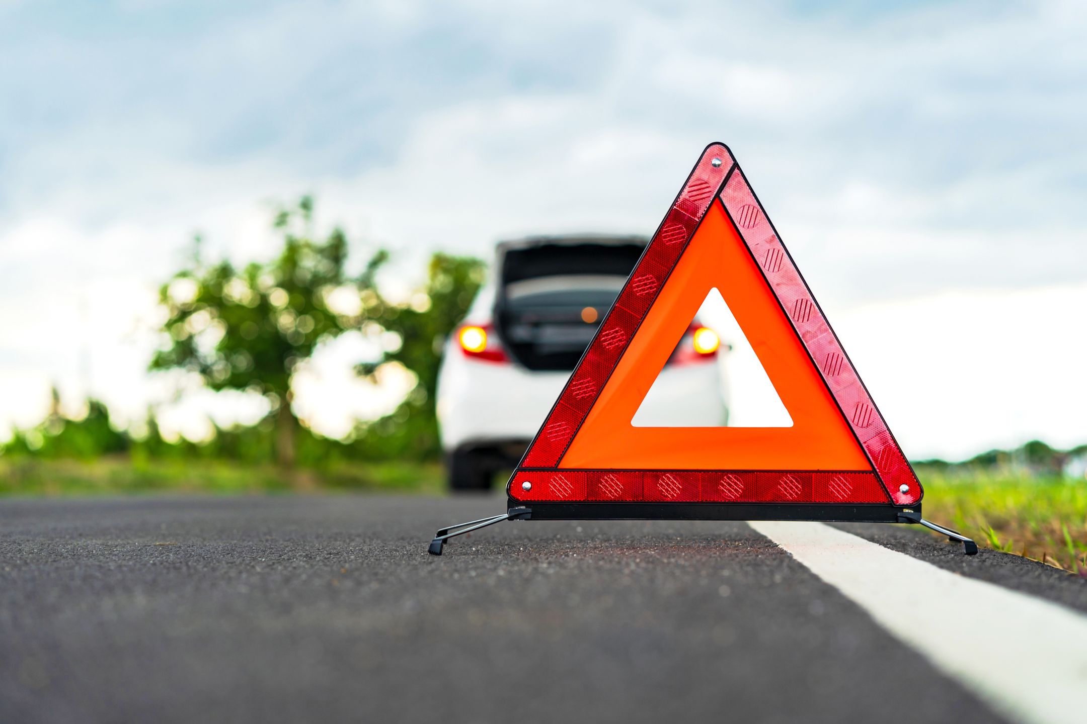 Problems car and a red triangle warning sign on the road
car, road, assistance, triangle, breakdown, roadside, red, emergency, warning, broken, sign, accident, problem, down, vehicle, safety, help, highway, traffic, trouble, driver, travel, engine, danger, automobile, failure, auto, side, transportation, tyre, silver, stop, light, reflective, repair, automotive, summer, nature, blue, fuel, empty, space, outdoor, push, petrol, caution, damaged, move, gas, white