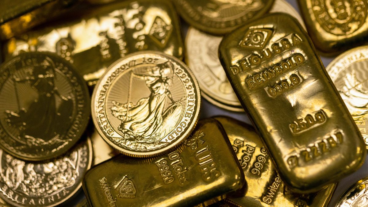 A selection of various weighted gold bars and coins arranged at Gold Investments Ltd. bullion dealers in London, U.K., on Thursday, March 17, 2022. Gold rose for a second day as investors weigh the trajectory of the Federal Reserves rates tightening cycle against risks to growth from the war in Ukraine. Photographer: Chris Ratcliffe/Bloomberg via Getty Images