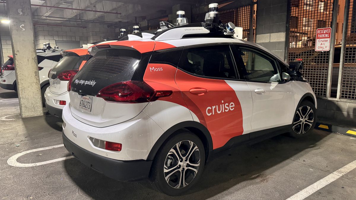 SAN FRANCISCO, CALIFORNIA - OCTOBER 24: 'Cruise' driverless robot taxis are seen at a parking lot as California Department of Motor Vehicles (DMV) revokes its self-driving car permit and citing 'unreasonable risk to public safety' in San Francisco, California, USA on October 24, 2023. The self-driving service of 'Cruise', the autonomous vehicle company owned by General Motor, is thought to be a step towards wider commercial deployment of a long-promised autonomous alternative to ride-hailing services such as Uber or Lyft in the US. (Photo by Tayfun Coskun/Anadolu via Getty Images)