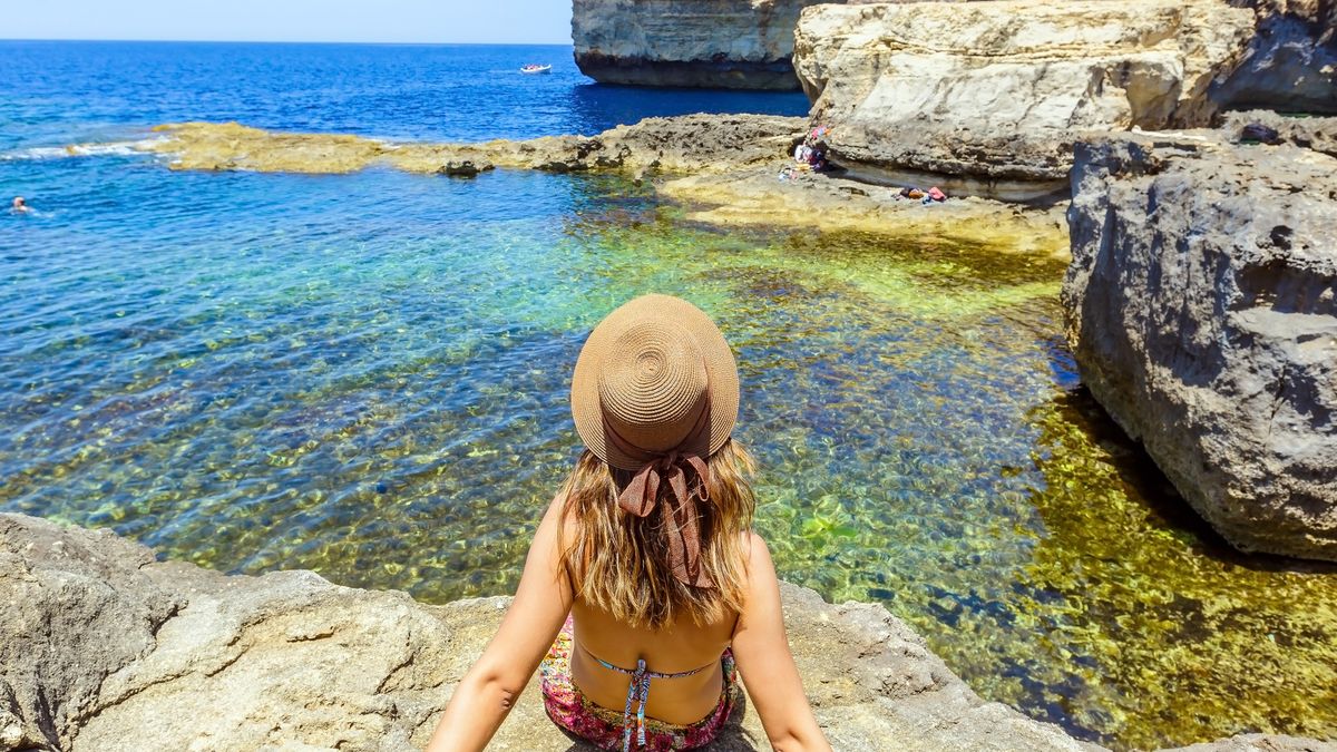 arch, azure, bay, beach, beauty, blue, cliff, coast, coastline, dwejra, enjoying, europe, famous, female, formation, geology, gozo, hair, happiness, happy, hat, hole, hot, island, landscape, limestone, malta, maltese, mediterranean, natural, nature, ocean, outdoor, place, relaxing, rock, scene, sea, sky, smile, stone, summer, sun, tourist, travel, vacation, view, water, window, woman