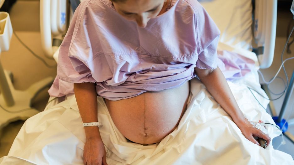 Young pregnant woman in the hospital ward and ready to delivery a baby.Young pregnant woman in the hospital ward and ready to delivery a baby.Kemal Yildirim