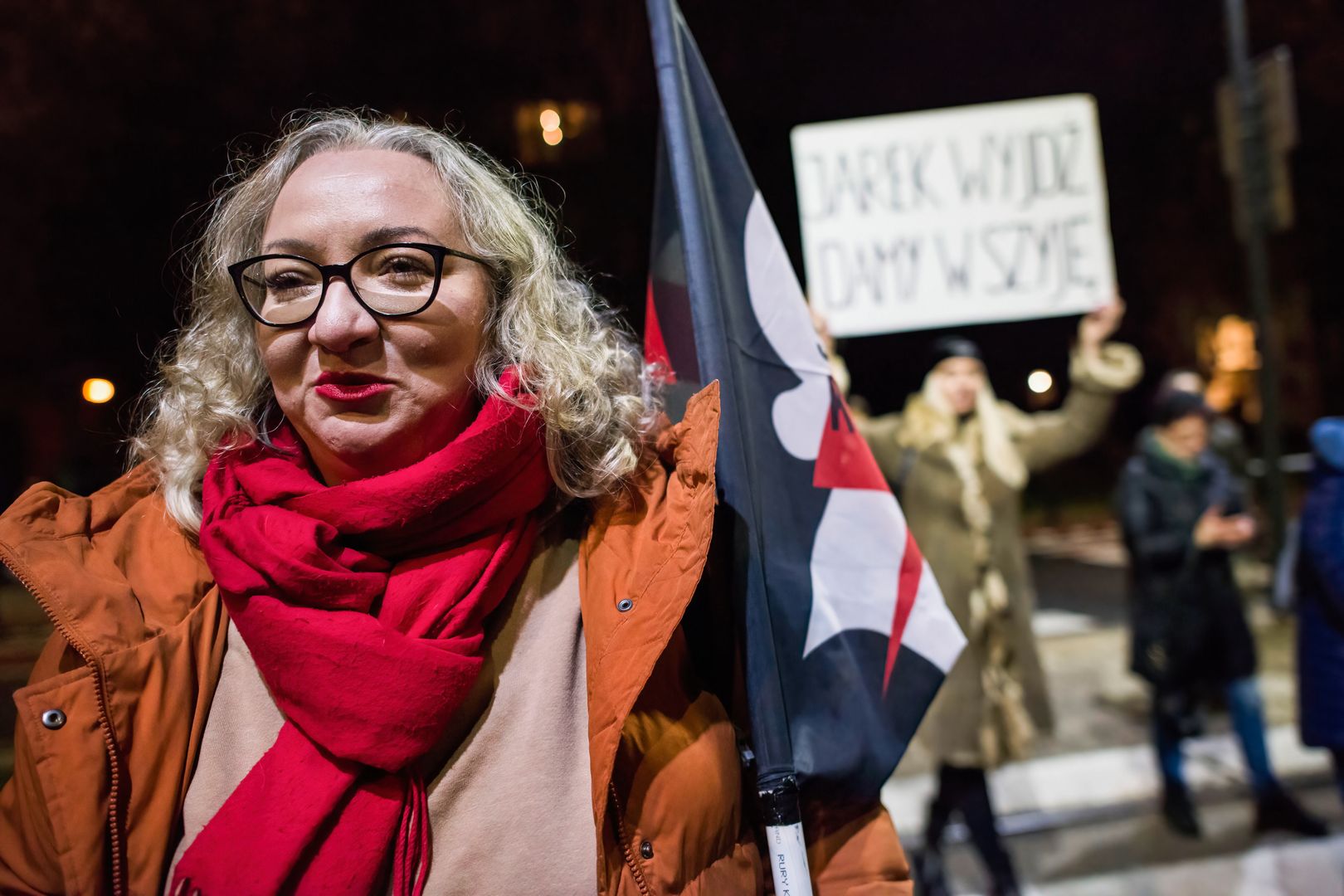 WARSAW, MAZOWIECKIE, POLAND - 2022/11/28: Marta Lempart, the leader of the Women's Strike is seen during the demonstration outside Kaczynski's house in Warsaw. On the 104th anniversary of women gaining the right to vote in Poland, hundreds of Poles protested in Warsaw against what they felt as contempt against women and an erosion of their rights under the conservative ruling party Law and Justice (PiS) in front of the house of party leader Jaroslaw Kaczynski. The protesters oppose a near-total ban on abortion pushed by the party two years ago. They are angry after Kaczynski blamed the country's low birth rate on women using alcohol. The protest was organized by the Women's Strike organization (Strajk Kobiet). (Photo by Attila Husejnow/SOPA Images/LightRocket via Getty Images)