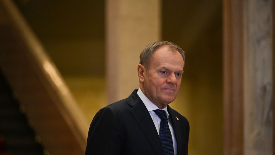 WARSAW, POLAND - DECEMBER 12:
Polish PM Donald Tusk heads to welcome French President Emmanuel Macron at the PM's Office in Warsaw, Poland, on December 12, 2024.
The leaders convened to discuss continued support for Ukraine, current global developments, the future of transatlantic relations, and Poland's priorities for its upcoming EU Council presidency, starting January 1, 2025. (Photo by Artur Widak/NurPhoto via Getty Images)