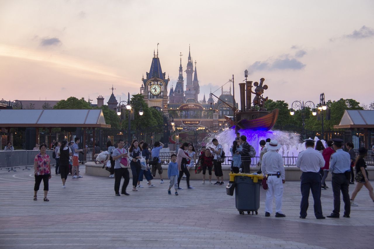 A Winnie the Pooh mascot was attacked by a tourist.