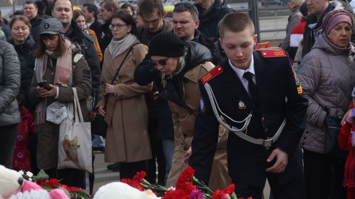 KRASNOGORSK, RUSSIA - MARCH 30: (RUSSIA OUT) People pray for the victims near Crocus City Hall, March 30, 2024 in Krasnogorsk, Russia. On March 22, the Crocus City Hall entertainment venue was attacked by a group of four gunmen, who killed at least 144 people, according to Russian authorities. An Islamic State affiliate who operates on the Afghan-Pakistan border claimed responsibility for the attack. (Photo by Contributor/Getty Images)