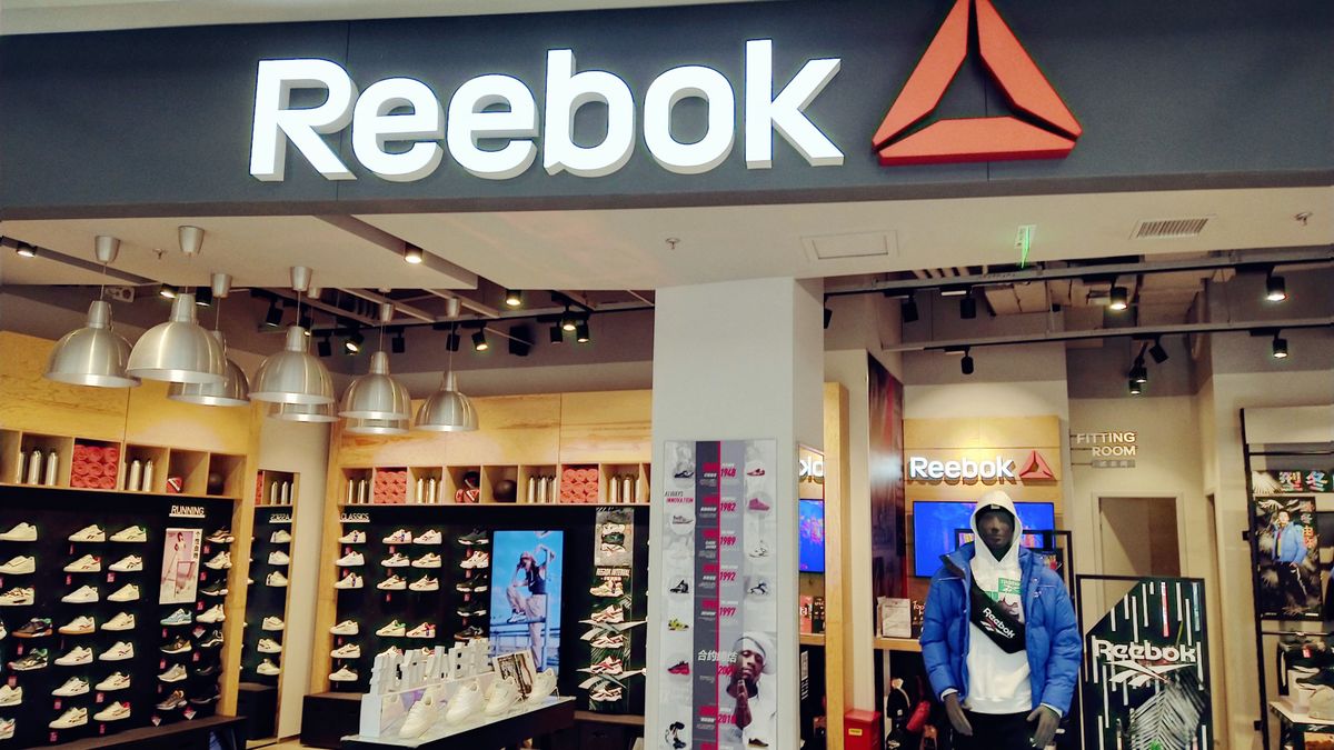 SHANGHAI, CHINA - OCTOBER 13, 2019 - Photo taken on Oct. 13, 2019 shows a REEBOK store in Shanghai, China. On April 18, 2022, several consumers said they received a text message from Adidas informing them that their personal information would be transferred to Shanghai United Asia Commercial Co., LTD simultaneously with the REEBOK business. In 2006, Adidas bought all of Reebok for $3.8 billion. In August 2021, international brand management group ABG announced the acquisition of Adidas's Reebok brand for 2.1 billion euros. (Photo credit should read CFOTO/Future Publishing via Getty Images)