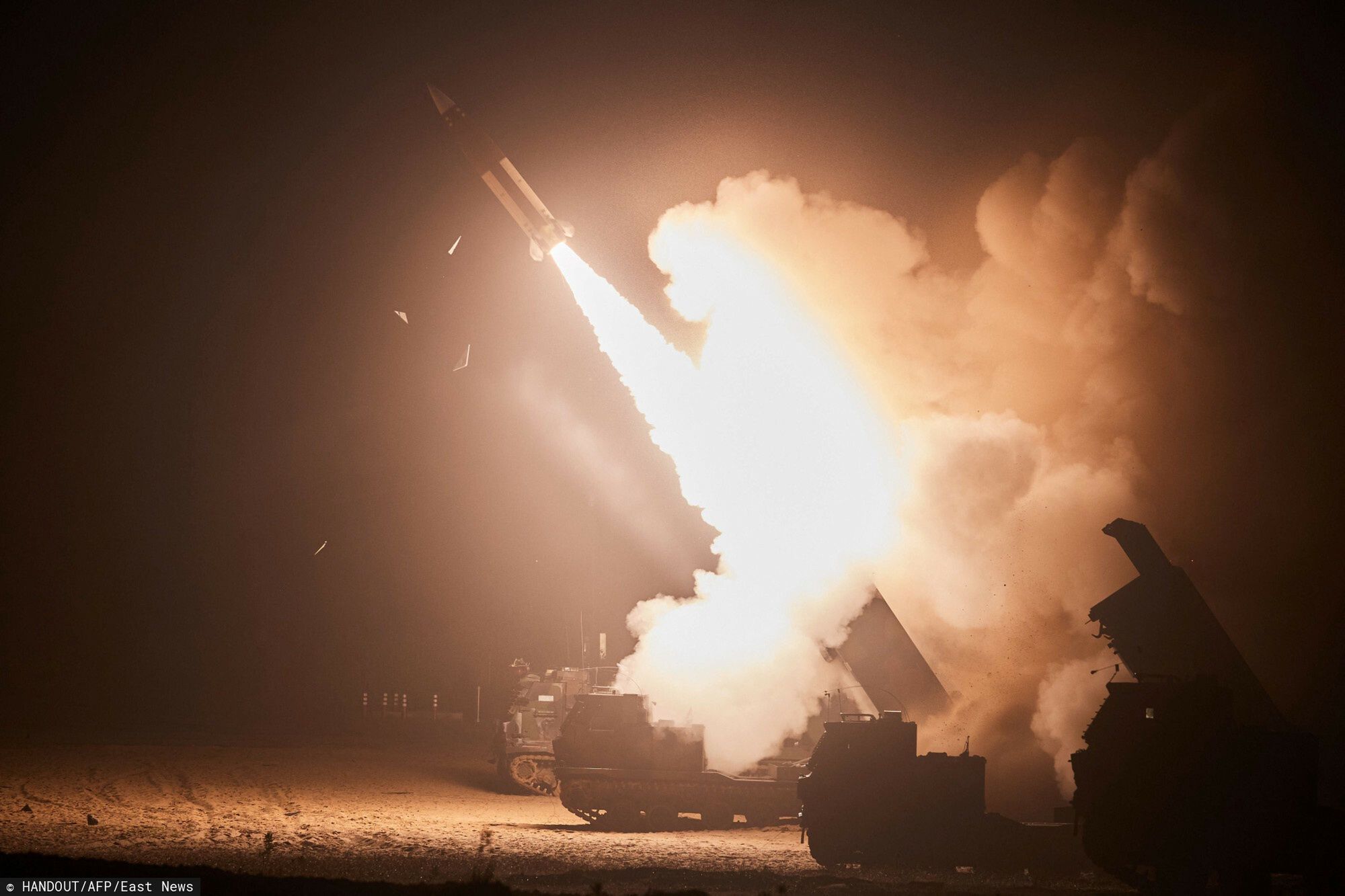 arch51
This handout photo taken on June 6, 2022 and released by South Korea's Joint Chiefs of Staff via Yonhap news agency in Seoul shows the Army Tactical Missile System (ATACMS) firing a missile from an undisclosed location on South Korea's east coast during a South Korea-US joint live-fire exercise aimed to counter North Korea?s missile test. - South Korea and the United States fired eight ballistic missiles on June 6 in response to North Korean weapons tests the previous day, Seoul's military said. (Photo by Handout / South Korea's Joint Chiefs of Staff / AFP) / RESTRICTED TO EDITORIAL USE - MANDATORY CREDIT "AFP PHOTO / South Korea's Joint Chiefs of Staff" - NO MARKETING NO ADVERTISING CAMPAIGNS - DISTRIBUTED AS A SERVICE TO CLIENTS
HANDOUT