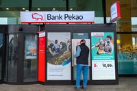 A customer uses an automated teller machine (ATM) at a Bank Pekao branch on Jerozolimskie Avenue in the center of Warsaw, Poland, on Tuesday, April 2, 2024. Polish inflation fell to the central bank's target for the first time in three years in March even as policymakers are expected to keep interest rates steady due to concerns over resurgent price growth later in 2024. Photographer: Damian Lemanski/Bloomberg via Getty Images