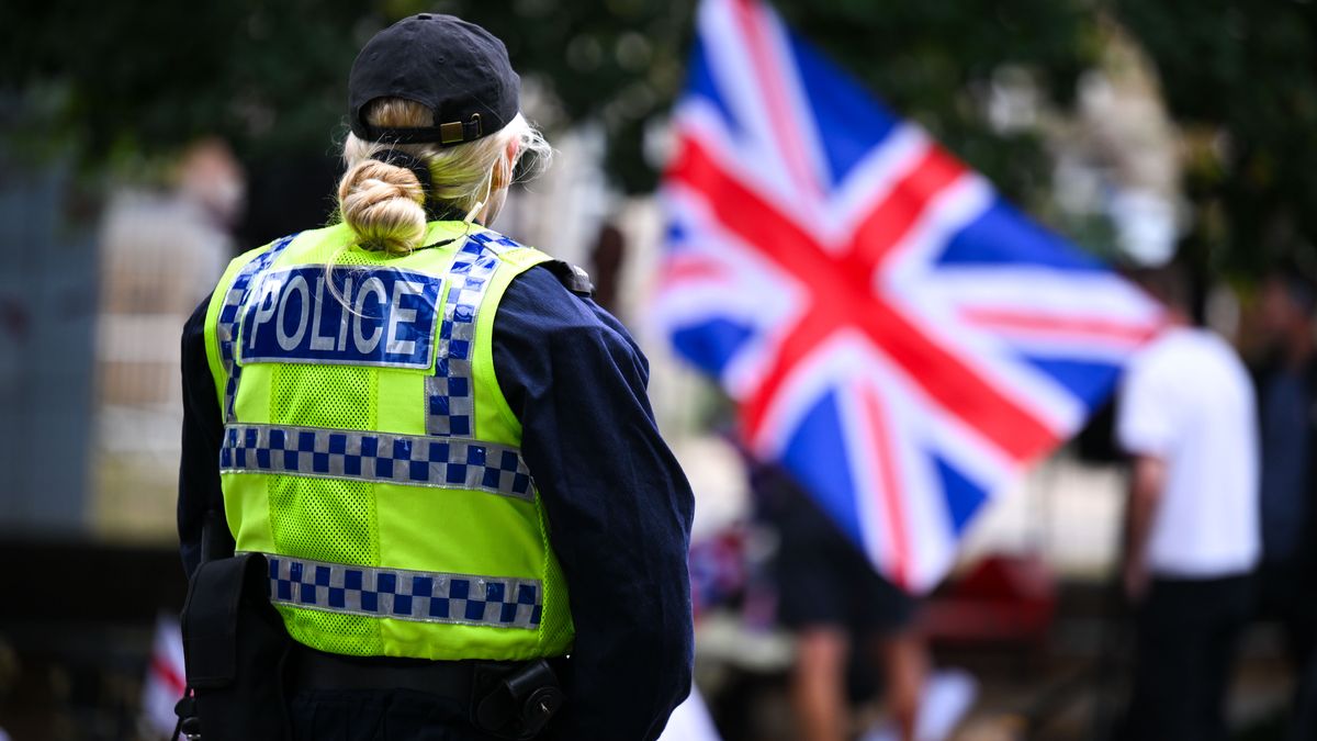 BOURNEMOUTH, ENGLAND - AUGUST 09: Police stand outside The Roundhouse hotel during a demonstration, on August 09, 2025 in Bournemouth, England. Protesters and counter-protesters have gathered outside hotels being used to house asylum seekers in recent weeks, as tensions flare over the government's policies on illegal migration, which has reached record numbers this summer. Some far-right politicians and campaigners have faced allegations of fanning the flames by spreading misleading data on crimes committed by foreign nationals, following isolated reports of migrant arrests in connection to sexual assault charges. (Photo by Finnbarr Webster/Getty Images)