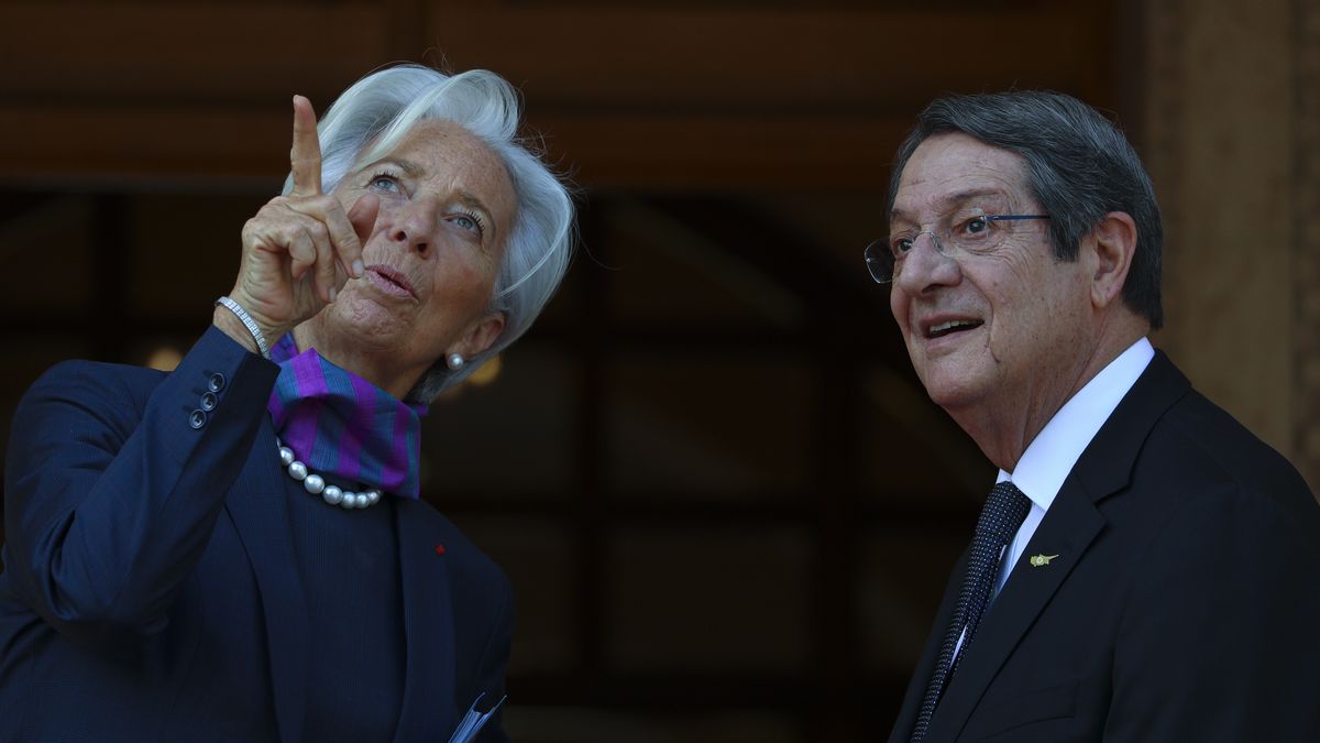 Cyprus President Nicos Anastasiades, right, talks with President of the European Central Bank Christine Lagarde as she gestures before their meeting at Presidential Palace in the capital Nicosia. Cyprus, Wednesday, March 30, 2022. Lagarde is visiting European Union member Cyprus amid the country's continuing efforts to buttress its banking system following a 2013 financial crisis that nearly brought the island nation to bankruptcy. (Photo by Danil Shamkin/NurPhoto via Getty Images)