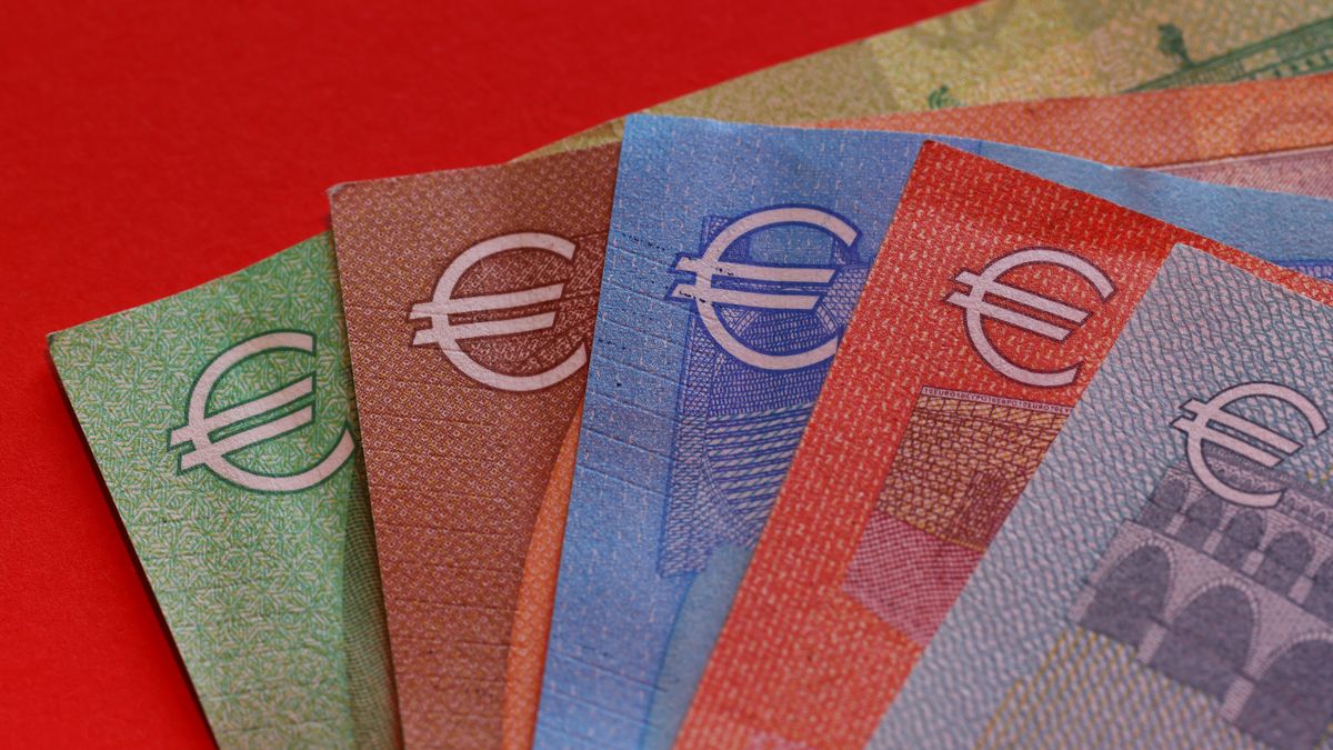 Euro currency symbols on mixed denomination euro banknotes, arranged in Riga, Latvia, on Monday, July 7, 2025. The Euro indicated weaker against the dollar in early Sydney trading after US President Donald Trump threatened a new 30% tariff rate against the European Union. Photographer: Andrey Rudakov/Bloomberg via Getty Images