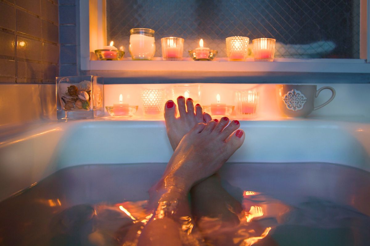 Candles burning on the bathtub