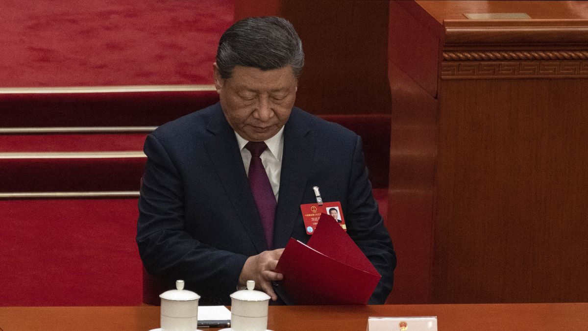 BEIJING, CHINA - MARCH 11: Chinese President Xi Jinping looks in a red folder at the closing session of the National Peoples Congress, or NPC, at the Great Hall of the People on March 11, 2025 in Beijing, China. China's annual political gathering known as the Two Sessions convenes  leaders and lawmakers annually to set the government's agenda for domestic economic and social development for the year.(Photo by Kevin Frayer/Getty Images)