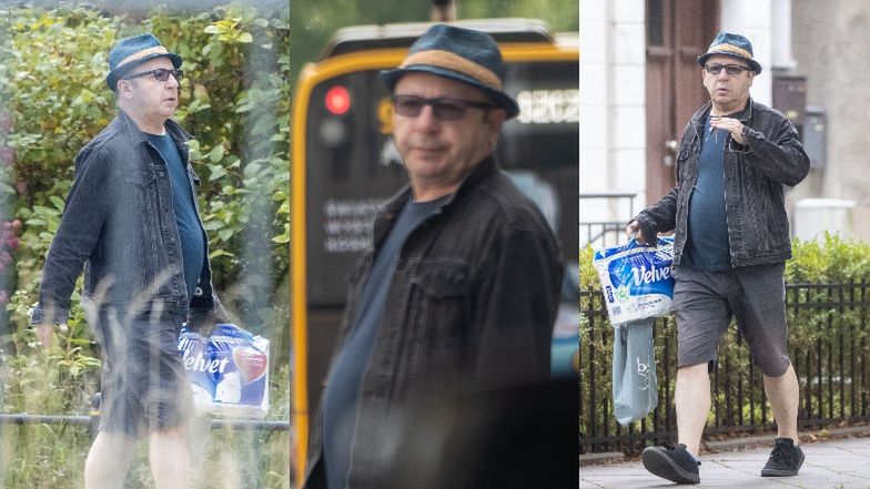 Zbigniew Zamachowski paraduje ulicą z papierem toaletowym
