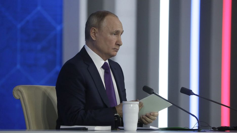 MOSCOW, RUSSIA - DECEMBER 23: (---EDITORIAL USE ONLY â MANDATORY CREDIT - "KREMLIN PRESS OFFICE / HANDOUT" - NO MARKETING NO ADVERTISING CAMPAIGNS - DISTRIBUTED AS A SERVICE TO CLIENTS----) Russian President Vladimir Putin speaks during his annual press conference at the Moscow Manege on December 23, 2021 in Moscow, Russia. More than 500 journalists are invited to Putin's end-of-year marathon press conference. (Photo by Kremlin Press Office / Handout/Anadolu Agency via Getty Images)