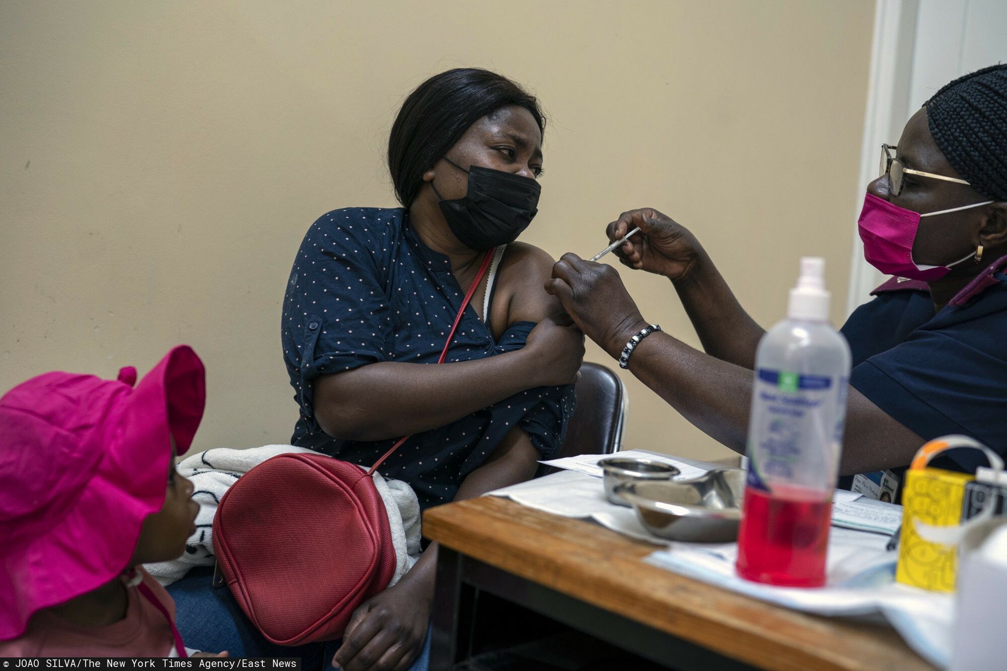 arch48A woman receives a dose of COVID-19 vaccine in Johannesburg, South Africa, on Tuesday, Nov. 30, 2021. Vaccines are finally available in many African countries, but some people there, as well as in South Asia, are wary of taking them. (Joao Silva/The New York Times)JOAO SILVA
