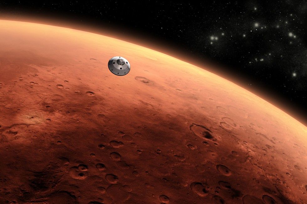 Wizualizacja Mars Science Laboratory na tle Czerwonej Planety