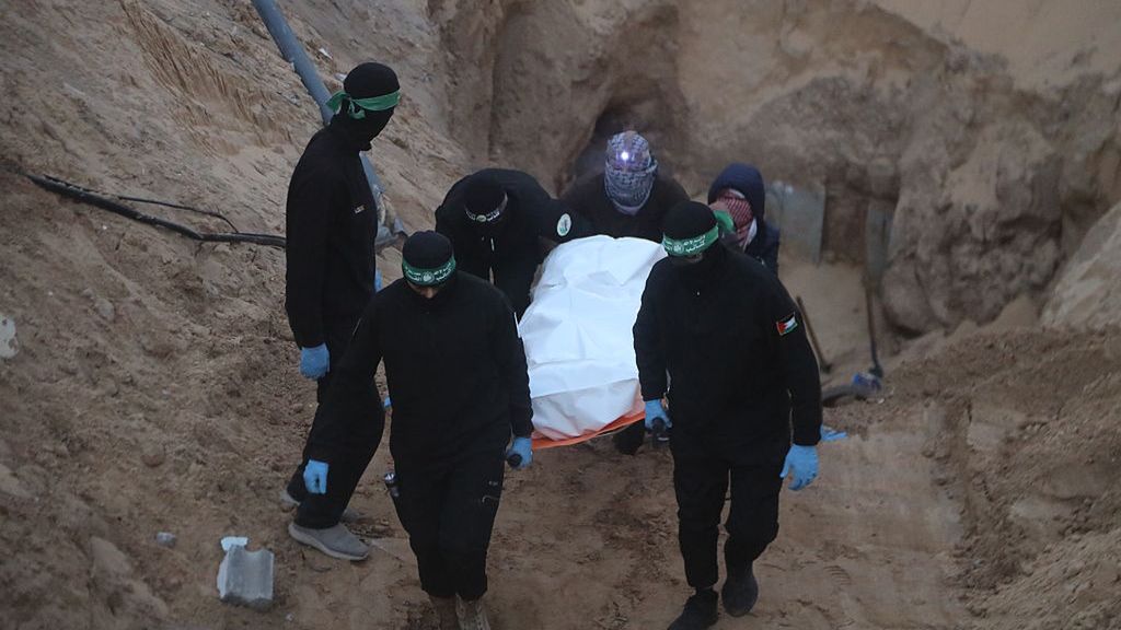 Body of Israeli hostage found at tunnel in Khan Yunis
KHAN YUNIS, GAZA - OCTOBER 28: The Izz al-Din al-Qassam Brigades, the armed wing of Hamas, recovered the body of an Israeli hostage from a tunnel in the Hamad area of Khan Yunis, Gaza on October 28, 2025. Search operations continue in Gaza to locate the bodies of Israeli hostage who were killed and remain under the rubble following attacks carried out after the ceasefire and prisoner exchange agreement between Israel and Hamas. (Photo by Abdallah F.s. Alattar/Anadolu via Getty Images)
Anadolu
HAMAS, prisoner exchange, Gaza, Izz al-Din al-Qassam Brigades, Israeli captive, Tunnel, Khan Yunis, ceasefire, Israel