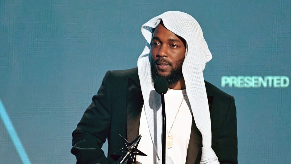 LOS ANGELES, CALIFORNIA - JUNE 09: Kendrick Lamar accepts the Album of the Year award for "GNX" onstage during the 2025 BET Awards at Peacock Theater on June 09, 2025 in Los Angeles, California.  (Photo by Paras Griffin/Getty Images for BET)
