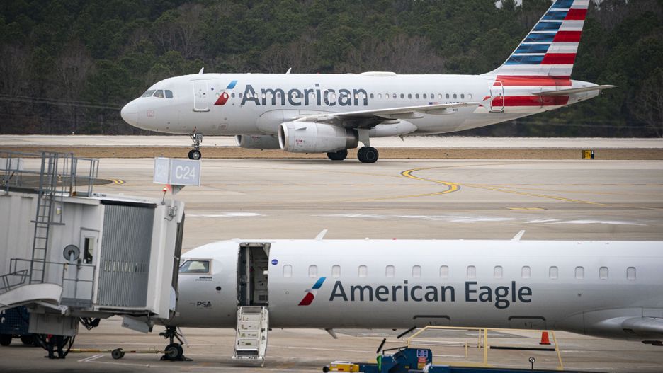 An American Airlines Group planes arrives at Raleigh-Durham International Airport (RDU) in Morrisville, North Carolina, U.S., on Thursday, Jan. 20, 2022. For the third time in less than two months, the U.S. aviation system on Tuesday faced the threat of widespread flight disruptions over potential 5G interference, only to get a temporary reprieve. Photographer: Al Drago/Bloomberg via Getty Images