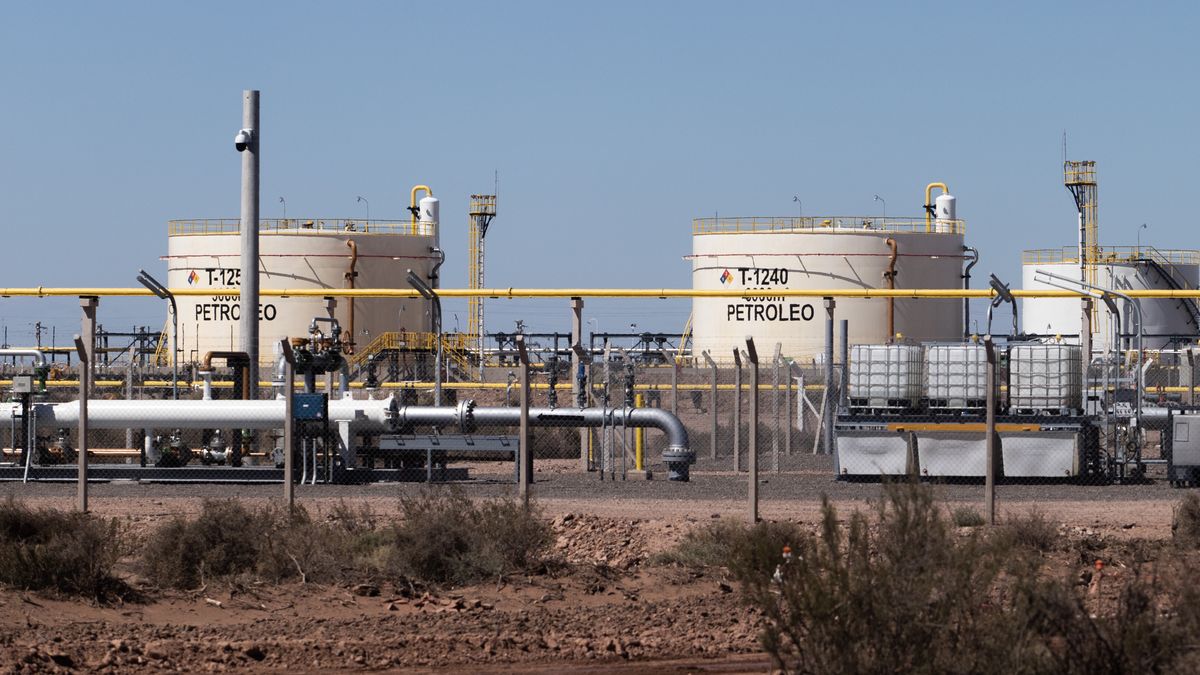 Oil pipelines and storage facilities are seen at Vaca Muerta shale oil and gas drilling, in the Patagonian province of Neuquen, Argentina February 15, 2023. (Photo by Matias Baglietto/NurPhoto via Getty Images)