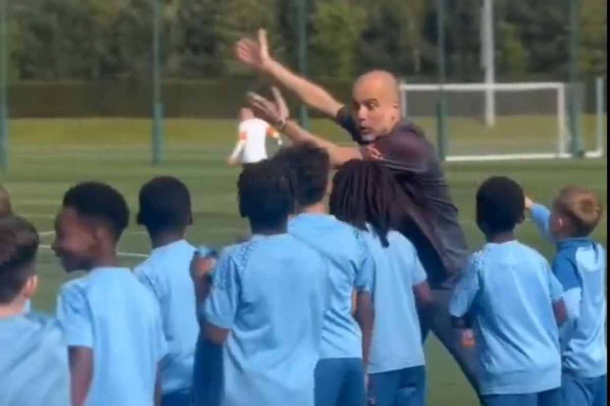 Pep Guardiola at the training with young Manchester City footballers