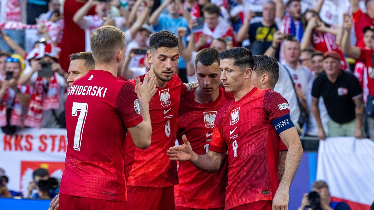 France v Poland - UEFA EURO 2024
Karol Swiderskii, Jakub Moder  Jakub Kiwior and Robert Lewandowskiare celebrating scoring a goal during the UEFA Euro 2024 Group D match between France v Poland, at the  BVB Stadion Dortmund in Dortmund, Germany, on June 25, 2024. (Photo by Andrzej Iwanczuk/NurPhoto via Getty Images)
NurPhoto
uefa competition, football, group stage, dortmund, nurphoto, dortmund match, team poland, teams, bvb stadion dortmund, andrzej iwanczuk, football stadium, team france, goal celebration, june 25, international competition, european championship, polish players, uefa euro 2024, euro 2024 qualifiers, players, european competition, uefa, france vs poland, european football., sporting event, tournament, french team, karol swiderski, matchday, football match