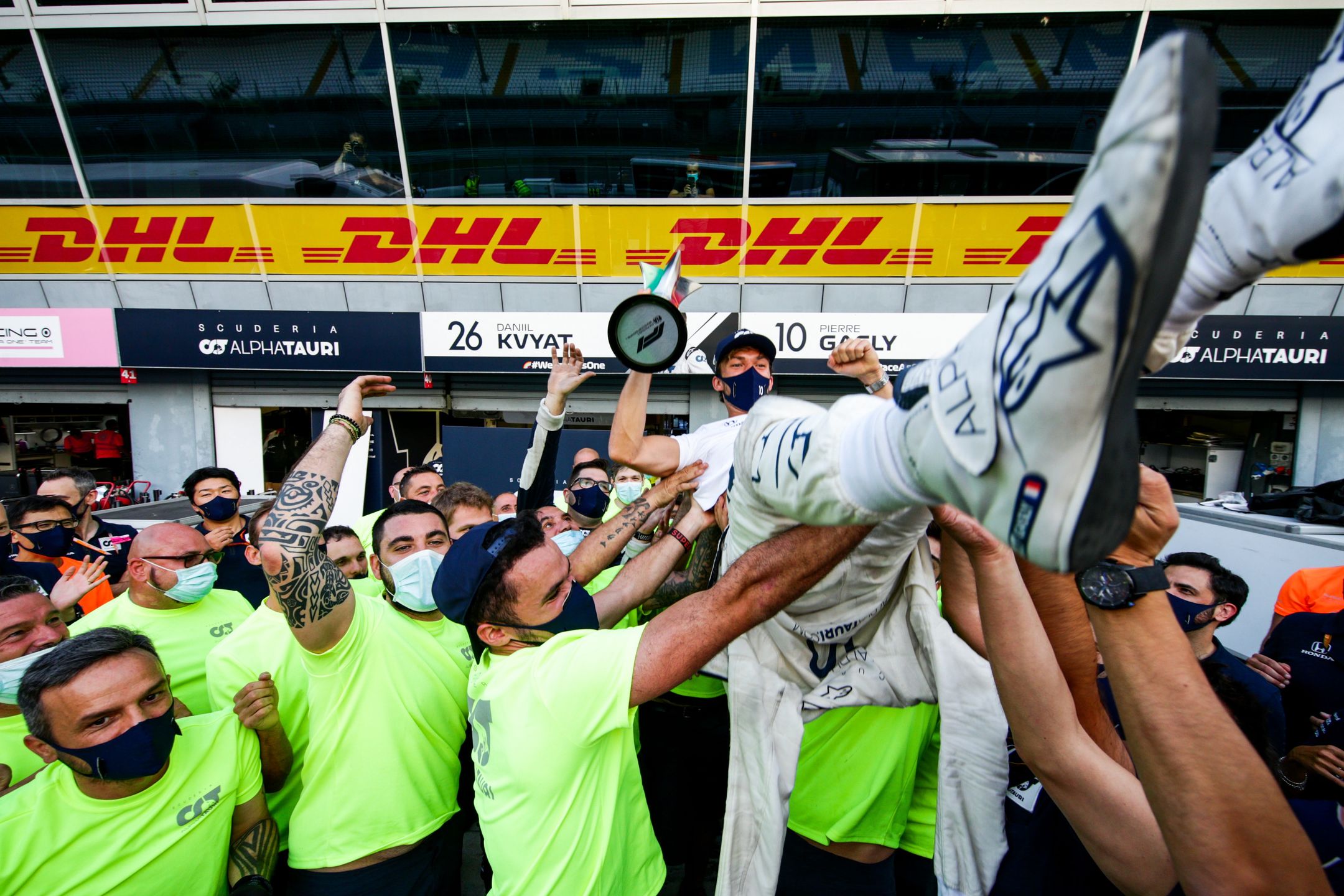 MONZA, ITALY - SEPTEMBER 06: Pierre Gasly of Scuderia AlphaTauri and France celebrates with the team after winning the F1 Grand Prix of Italy at Autodromo di Monza on September 06, 2020 in Monza, Italy. (Photo by Peter Fox/Getty Images)