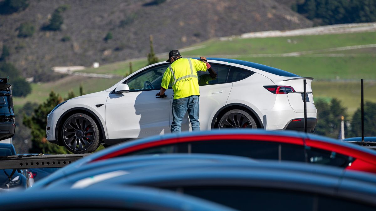 Vehicles are offloaded at a Tesla store in Colma, California, US, on Wednesday, Dec. 13, 2023. Tesla Inc. will fix more than 2 million vehicles, its biggest recall ever, after the top US auto-safety regulator determined its driver-assistance system Autopilot doesn't do enough to guard against misuse. Photographer: David Paul Morris/Bloomberg via Getty Images