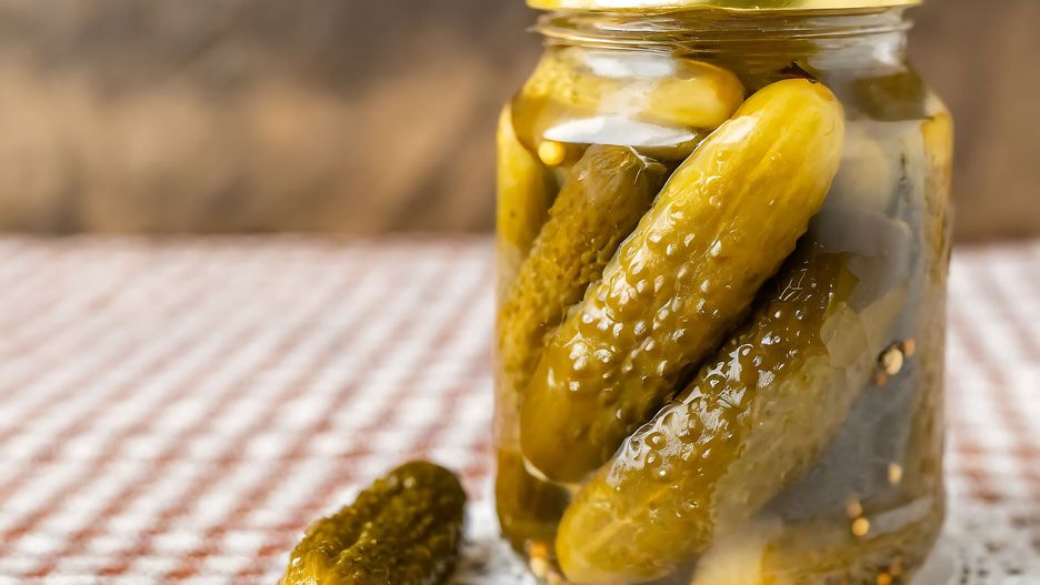 A jar filled with dill pickles alongside a plate of picked ones, on a checkered cloth.
pickles, dill, jar, glass, homemade, preserved, cucumbers, brined, vinegar, spices, plate, checkered, tablecloth, red, white, food, condiment, tart, snack, kitchen, cloth, gherkins, marinated, seasoned, tangy, fermented, traditional, side, dish, appetizer, sour, crunchy, flavorful, picnic, storage, canning, jars, gingham, table, healthy, pickles, dill, jar, glass, homemade, preserved, cucumbers, brined, vinegar, spices, plate, checkered, tablecloth, red, white, food, condiment, tart, snack, kitchen, cloth, gherkins, marinated, seasoned, tangy, fermented, traditional, side, dish, appetizer, sour, crunchy, flavorful, picnic, storage, canning, jars, gingham, table, healthy