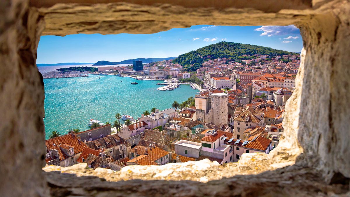 Split  bay aerial view through stone window, Dalmatia, Croatia
split, aerial, marjan, diocletian, harbor, historic, ancient, waterfront, palace, panorama, vacation, cityscape, croatian, tourism, town, view, rock, adriatic, architecture, blue, church, city, coast, croatia, europe, mediterranean, panoramic, dalmatian, destination, vacations, cathedral, tourist, bay, sea, ocean, water, yacht, marine, riva, yachting, sailing, boat, palm, seafront, turquoise, hill, window, stone, postcard, collage, split, aerial, marjan, diocletian, harbor, historic, ancient, waterfront, palace, panorama, vacation, cityscape, croatian, tourism, town, view, rock, adriatic, architecture, blue, church, city, coast, croatia, europe, mediterranean, panoramic, dalmatian, destination, vacations, cathedral, tourist, bay, sea, ocean, water, yacht, marine, riva, yachting, sailing, boat, palm, seafront, turquoise, hill, window, stone, postcard, collage