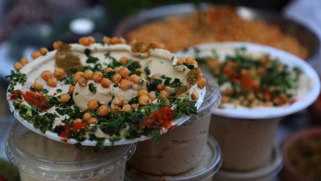 Ramadan In Gaza
A Palestinian vender prepare chickpeas known as hummus for breakfasting during the Muslim fasting month of Ramadan in Gaza City on April 16, 2021, amid the COVID-19 pandemic. 
 (Photo by Majdi Fathi/NurPhoto via Getty Images)
NurPhoto
gaza - palestine, ramadan 2021, muslim, muslim people, april 16, 16th april 2021, palestinian people, pandemic