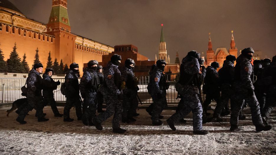 MOSCOW, RUSSIA - DECEMBER 31 (RUSSIA OUT) Russian National Guard Service's OMON special unit officers, wearing uniform, walk on Red Square near the Kremlin on December 31, 2023 in Moscow, Russia. Hundreds people gathered in Central Moscow to celebrate New Year's Eve, while the authorities banned holiday fireworks in most cities of the country, including the capital. (Photo by Contributor/Getty Images)
