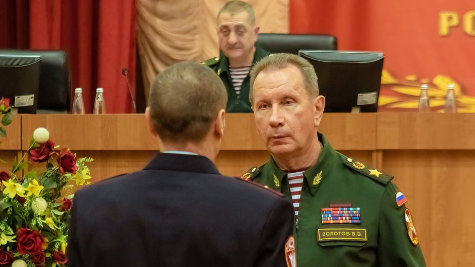 Director of the Russian Guard Viktor Zolotov (R) seenMOSCOW, RUSSIA - 2018/12/21: Director of the Russian Guard Viktor Zolotov (R) seen rewarding a serviceman.In Moscow, General of the Army Viktor Zolotov and also director of the Federal Service of the National Guard of the Russian Federation presents the personal standard of the commander of the Central District of the National Guard of the Russian Federation of a new design to Colonel-General Igor Golloyev. (Photo by Mihail Siergiejevicz/SOPA Images/LightRocket via Getty Images)SOPA Imagescentral district, personal standard, presentation, rewarding, russian, russian guard, serviceman, viktor zolotov