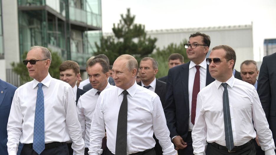ANAPA, KRASNODAR TERRITORY, RUSSIA - AUGUST 16, 2019: Russian Security Council Secretary Nikolai Patrushev, Russia's President Vladimir Putin, and Russia's Prime Minister Dmitry Medvedev (L-R) visit the Volley Grad sports and health center. Alexei Nikolsky/Russian Presidential Press and Information Office/TASS (Photo by Alexei Nikolsky\TASS via Getty Images)