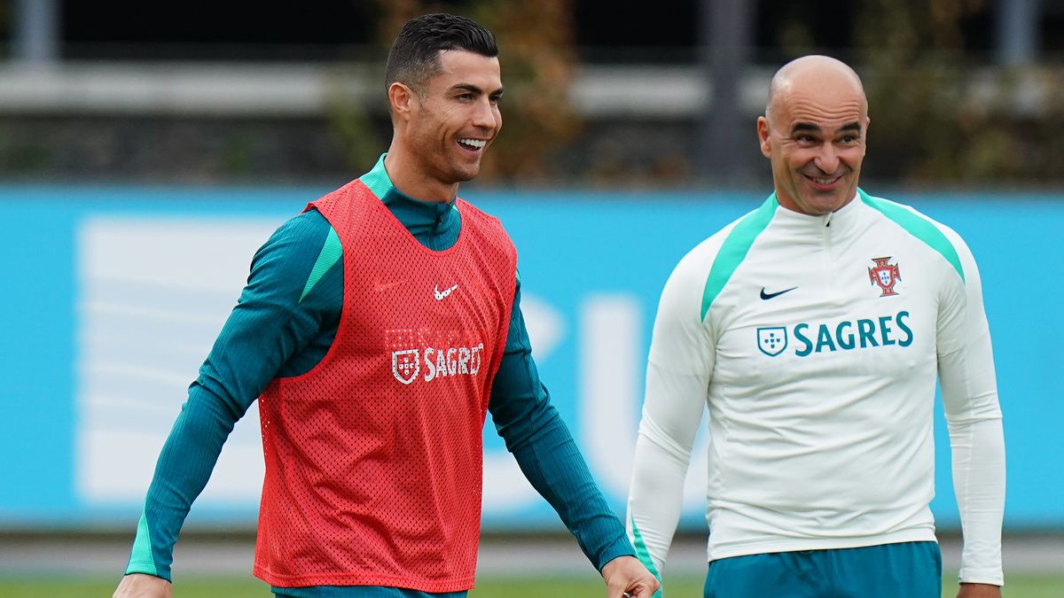 OEIRAS, PORTUGAL - OCTOBER 8: Cristiano Ronaldo of Portugal with Head Coach Roberto Martinez of Portugal during the Portugal Training Session at Cidade do Futebol FPF on October 8, 2024 in Oeiras, Portugal.  (Photo by Gualter Fatia/Getty Images)