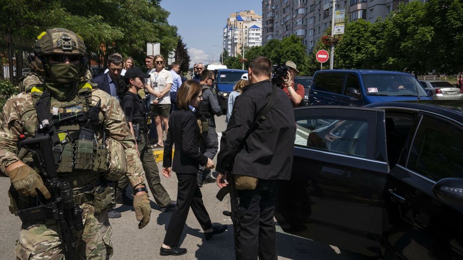Temporary
President of Moldova Maia Sandu, center, leaves after visiting the Church of Saint Andrew the First-Called Apostle Andrii Halavin, in Bucha, Kyiv Region, northern Ukraine, June 27, 2022. (AP Photo/Nariman El-Mofty)
AP