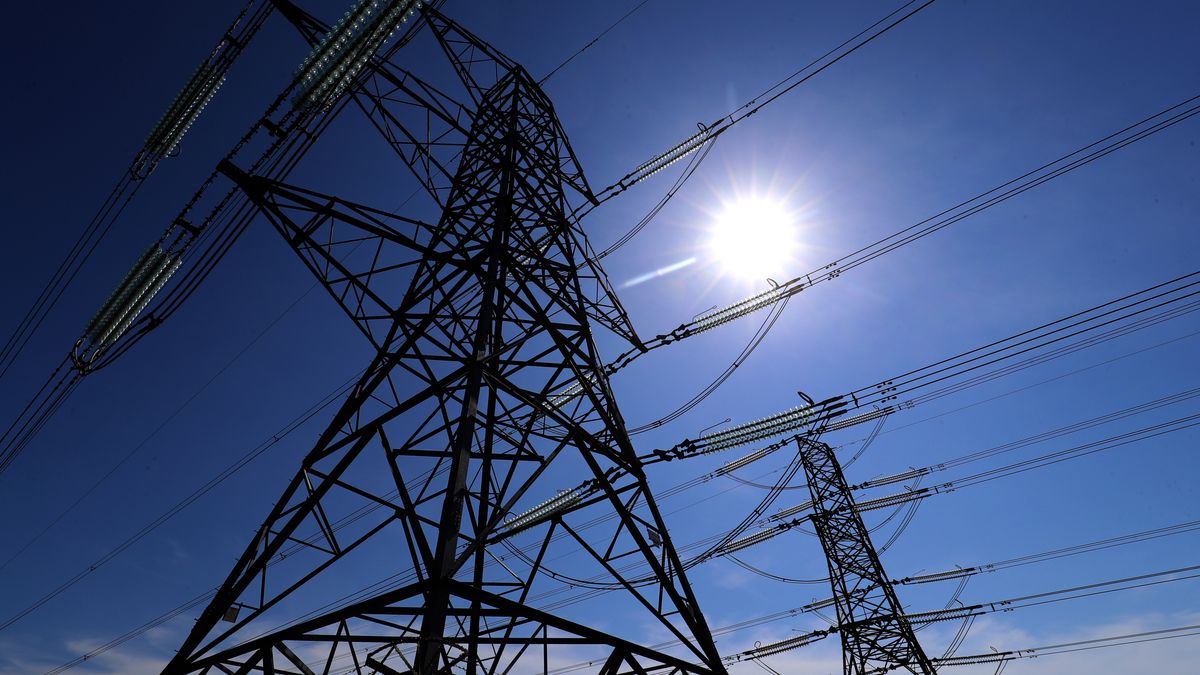 Electricity pylons carry power away from Dungeness nuclear power station in Kent as the National Grid warned that a record low demand for electricity during the UK's coronavirus lockdown could lead to windfarms and power plants being turned off to avoid overloading the electricity grid. (Photo by Gareth Fuller/PA Images via Getty Images)