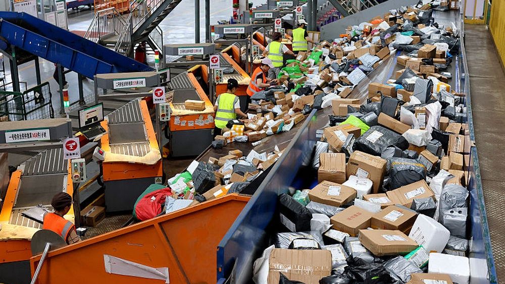 Logistics Companies Busy With Mid-year Shopping Festival Across China
ZAOZHUANG, CHINA - JUNE 18: Workers sort packages at a delivery center of China Post Group on June 18, 2026 in Zaozhuang, Shandong Province of China. China's mid-year shopping spree, known as the "618" shopping festival, triggered a peak in e-commerce logistics nationwide. Logistics companies operated at full capacity to ensure the smooth collection and delivery of parcels. (Photo by Sun Zhongzhe/VCG via Getty Images)
VCG
zaozhuang, manual worker, china