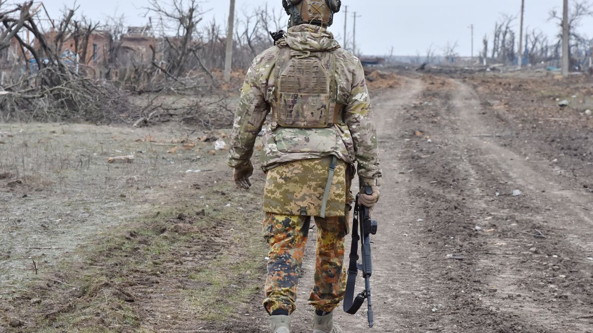 ROBOTYNE, ZAPORIZHZHIA, UKRAINE - 2024/03/01: A Ukrainian army soldier walks along the street in Robotyne. Fierce fighting continues in the areas of Robotyne village in Zaporizhzhia region, where the Russians armed forces are trying to regain control. The Armed Forces of Ukraine liberated the village of Robotyne in the Tokmak community in the southeastern Zaporizhzhya region in August 2023. (Photo by Andriy Andriyenko/SOPA Images/LightRocket via Getty Images)