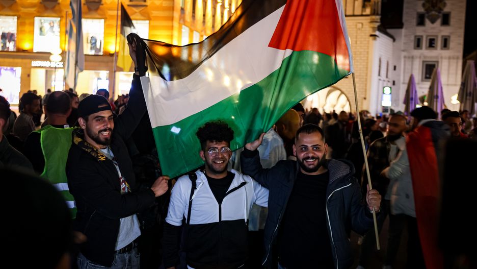 MUNICH, GERMANY - OCTOBER 9: Demonstrators with Palestinian flags gather to show their support for the recent Hamas attack against Israel on October 9, 2023 in Munich, Germany. On October 7 the Palestinian militant group Hamas launched a large-scale surprise attack from Gaza, launching thousands of missiles and sending an estimated thousand fighters by land, sea and air into Israel. At least 700 Israelis have been confirmed killed and 150 kidnapped. 560 Palestinians are also confirmed killed. The attack prompted retaliatory strikes by Israel on Gaza and a declaration of war by the Israeli prime minister. (Photo by Leonhard Simon/Getty Images)